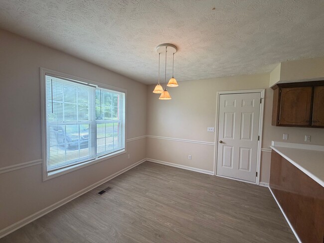 Building Photo - Move-In Ready! Fresh Updates, Fenced Backyard & Prime Smyrna Location!