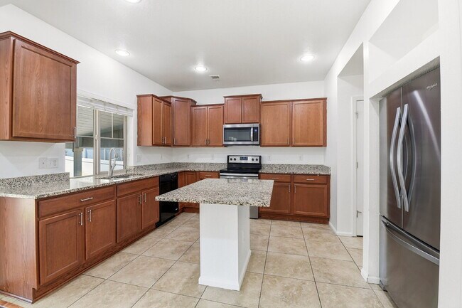 Building Photo - $2,940.95 - 4 Bed, 3 Bath Home in Denver with Central A/C and Fenced in Yard!