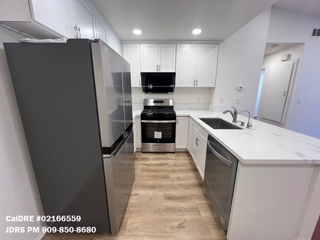 Building Photo - Price Lowered! Second Floor Ontario 2 Bedr...