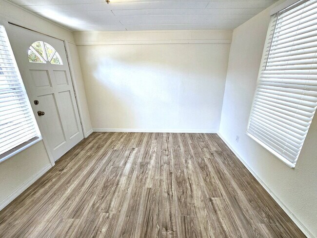 Building Photo - fully renovated 2-bedroom, 1-bathroom home with bonus guest room or office and oversized fenced yard