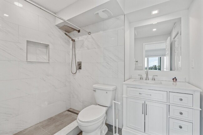 Building Photo - NEWLY RENOVATED TWO BEDROOM CONDO IN WATERFRONT RESORT STYLE COMMUNITY