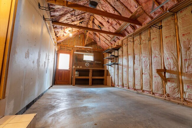 Building Photo - Private river access and stunning views from this home on Harmon Blvd! + Bonus Room