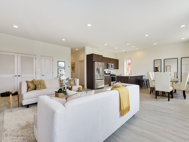 Living Room Open to Kitchen - North Oak Lofts