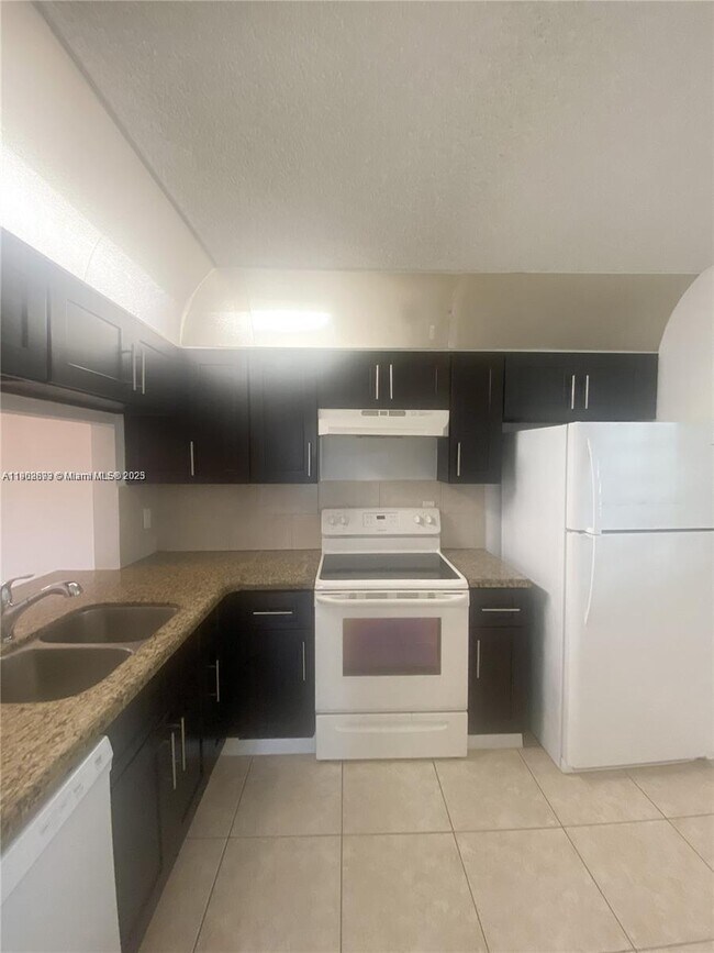 Building Photo - 10489 NW 8th St