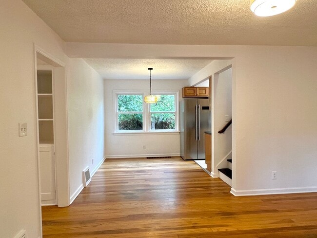 Building Photo - This beautifully updated home offers a bri...