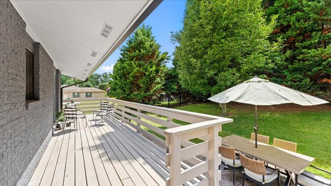 Building Photo - Renovated Mid-Century Modern Home in Belmont West with Finished Basement & Fenced Yard