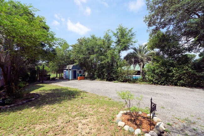 Building Photo - Charming Home in Poquito Bayou – A Nature ...
