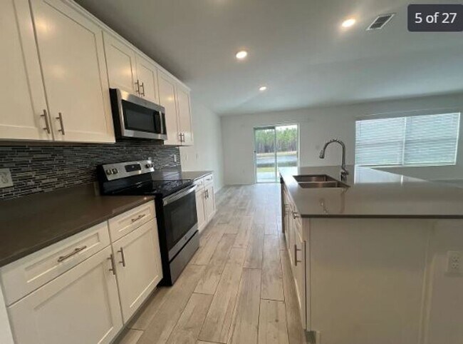 Building Photo - 4 Bedroom 2 bath home in the Preserves at LPGA for RENT!