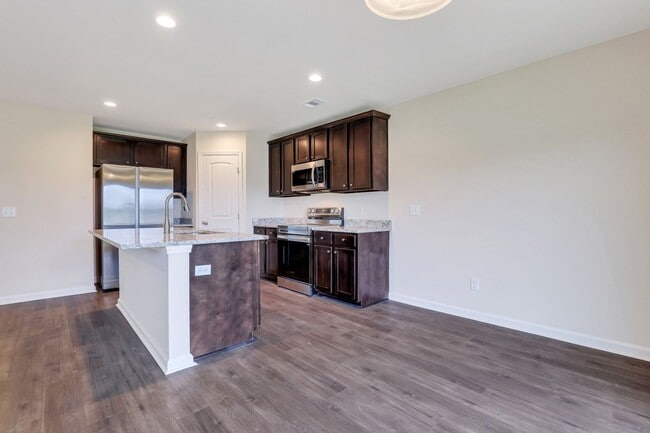 Building Photo - New Construction - 3 Bed 2 1/2 Bath, attached garage townhome