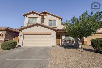 Building Photo - 4Bed/2.5 Bath House at Greenway/75th Ave! Ready for Immediate Move-In! -- Gated Community!