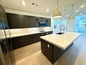 Building Photo - LIVE IN A NEW HOME!