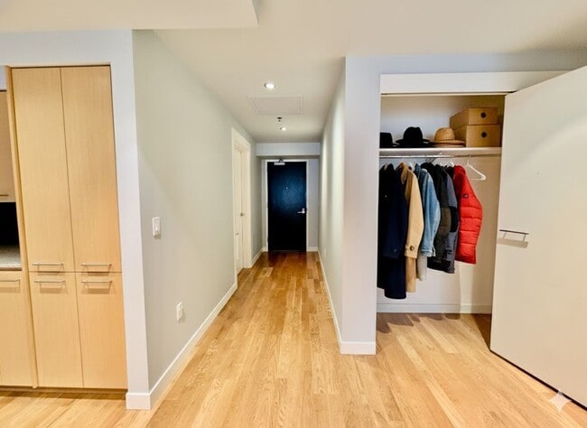 Building Photo - Exquisite Condominium at the Renowned Waterfront Pearl with Views of the River, Work Out Facility...