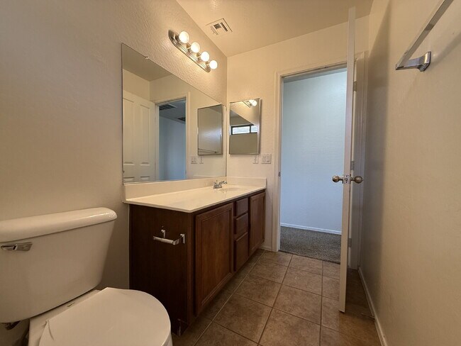 Building Photo - "Spacious 4-Bedroom Haven with 2 Bath Retreats in Laveen's Heart – 1,893 Sq Ft of Comfort!"