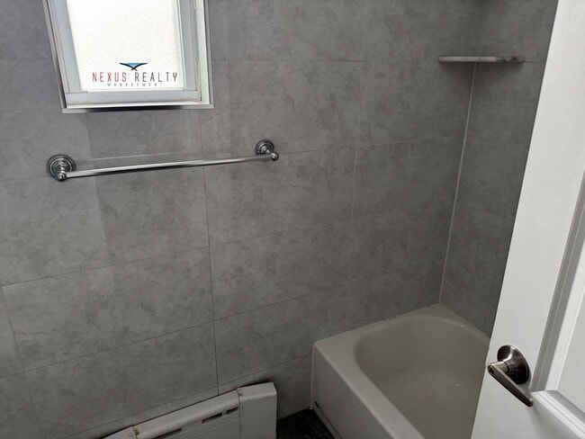 Building Photo - 21-44-44 71st St