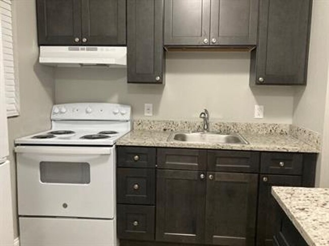Building Photo - Newly Updated Apartments - Affordable and ...
