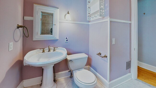 Building Photo - [In-Unit Laundry; Garden] Townhouse-Style Living, with Historical Details & Parking!