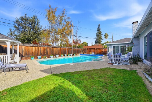 Building Photo - One-of-a-Kind Home with Pool, Gazebo, and Sunken Conversation Pit!