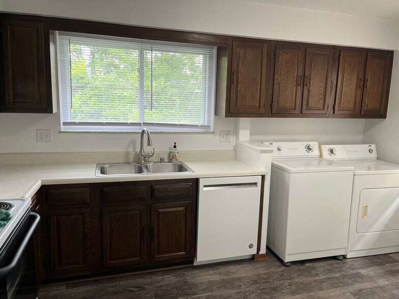 Kitchen with full size washer and dryer - 1588 Jones Dr