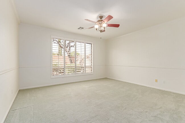 Building Photo - "Charming 2-Bedroom + Den Oasis with Spaci...