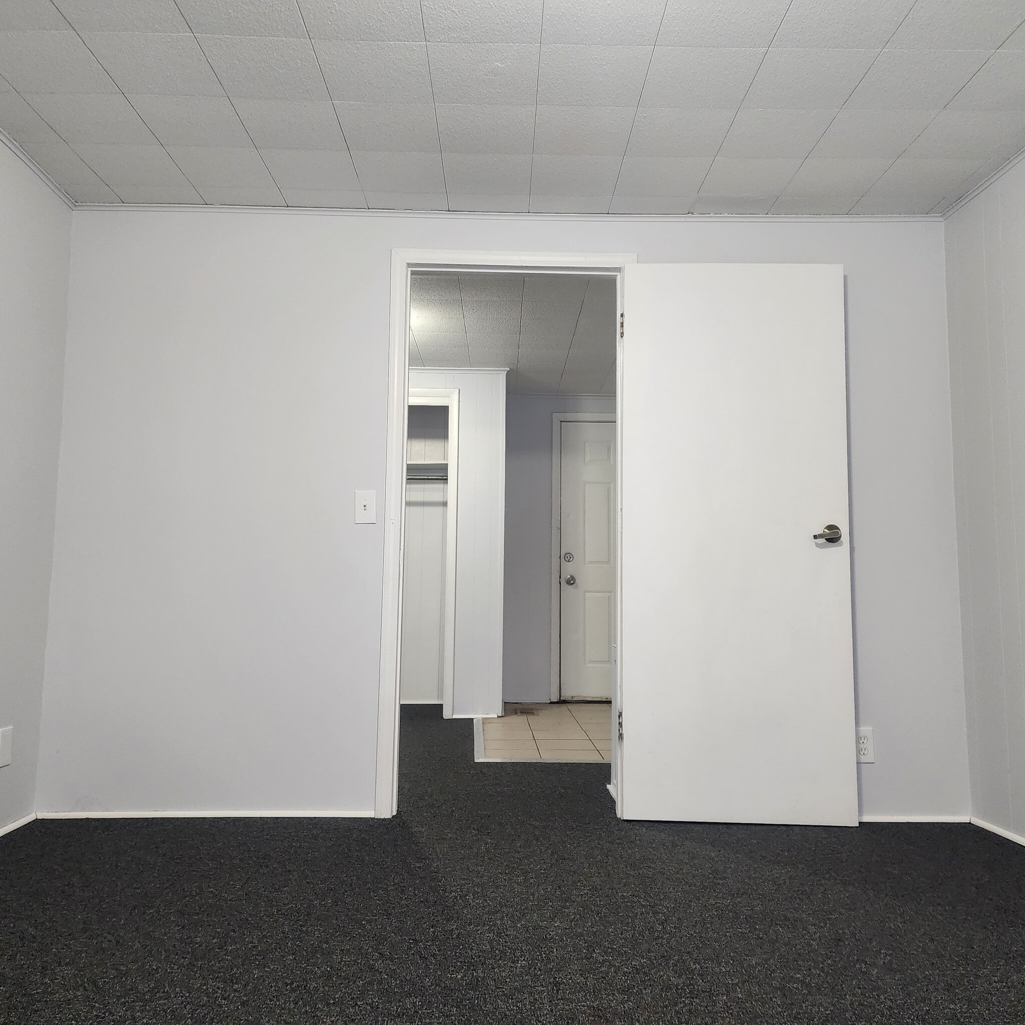 Back Bedroom looking out towards exterior door - 396 Norton St