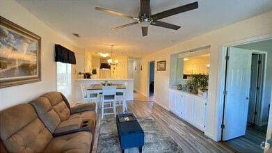 Building Photo - Beautifully furnished 2 bedroom/2 bath 1st...