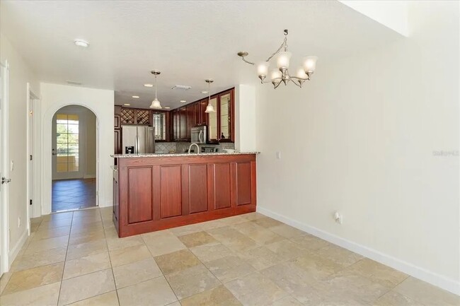 Custom kitchen with bar - 8438 Gilford Ln