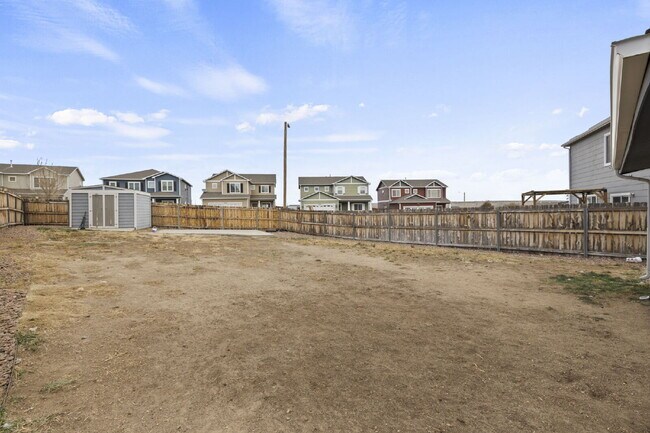 Building Photo - Spacious 4-Bedroom Home with Loft, Solar & Fenced Backyard