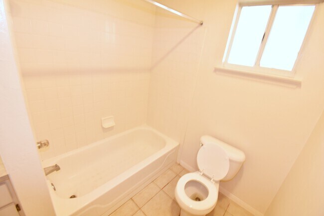 Building Photo - * RENT SPECIAL $200 OFF RENT NEW PRICE $21...