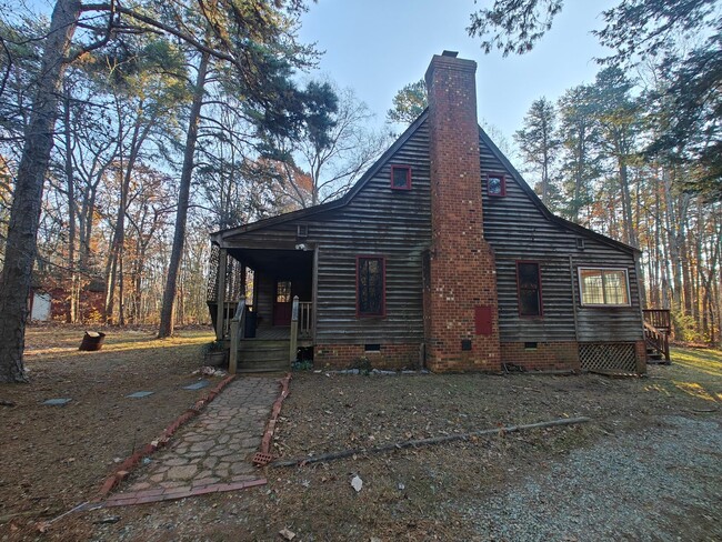 Building Photo - # bedroom home nestled in the woods