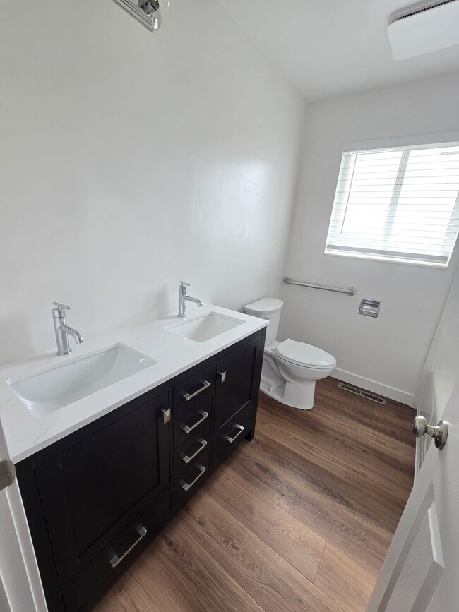 Building Photo - Remodeled 4 Bed, 2 Bath with Double Kitchen & Covered Carport
