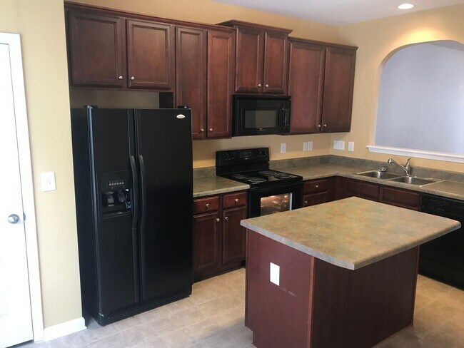 Building Photo - **Charming 2/2.5 Burlington Townhome**