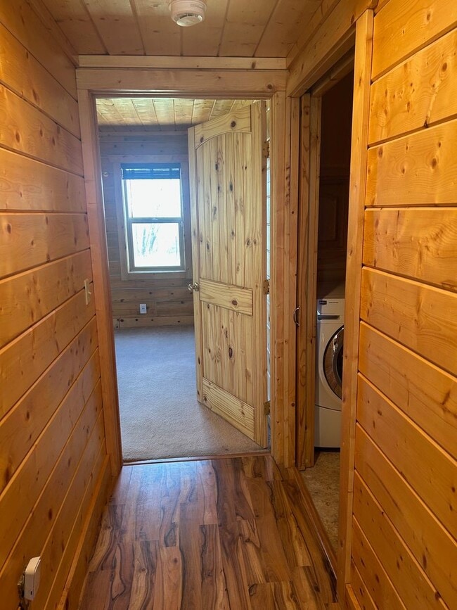 Building Photo - Gorgeous Log Home with infloor heat.  Two level lots with RV parking and dumpstation.