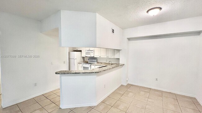 Building Photo - 3021 Alcazar Pl