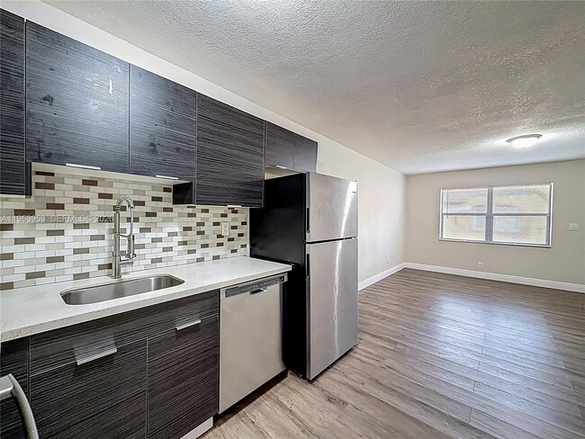 Building Photo - 1800 NW 52nd Ave