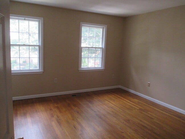 Building Photo - SPACIOUS BRICK TOWN-HOME