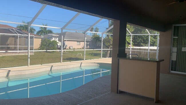 Building Photo - Dive Into Comfort – Home with Pool , Speci...
