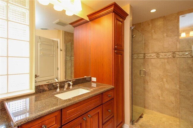 Building Photo - 7024 Pelican Bay Blvd