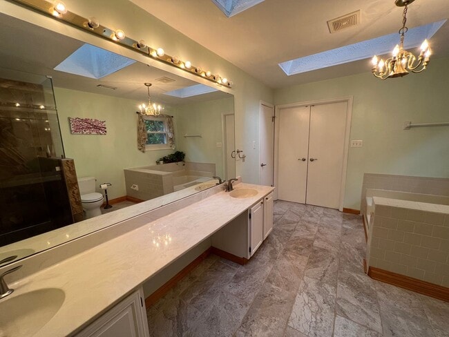 Building Photo - ***Coming Soon*** Spectacular 3 Bed 3.5 Bath Brick Home in Scenic Riverview Estates