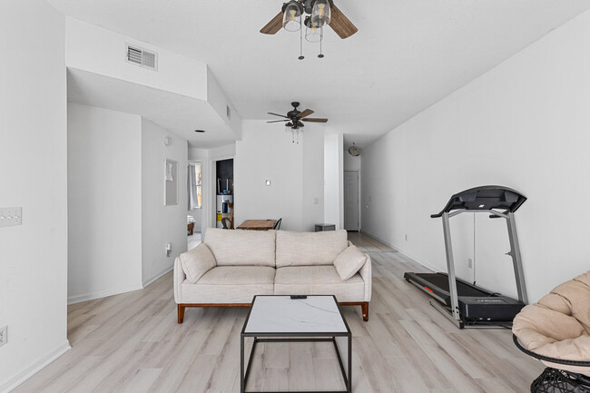 Living room, treadmill - 4210 Wilshire Blvd