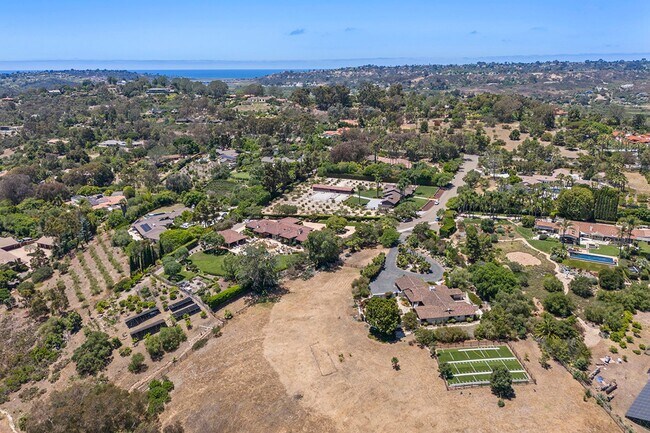 Building Photo - This Beautiful Hacienda Style Home combine...