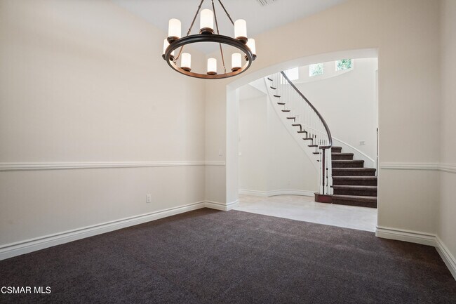Building Photo - 6077 Mandeville Pl