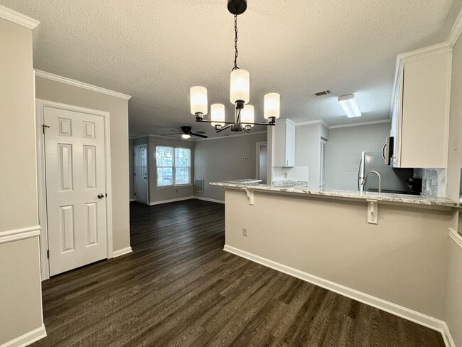 Building Photo - Updated 1st Floor/1-Level Condo Available NOW & Rent Includes Water, Sewer, Trash, Landscaping, F...