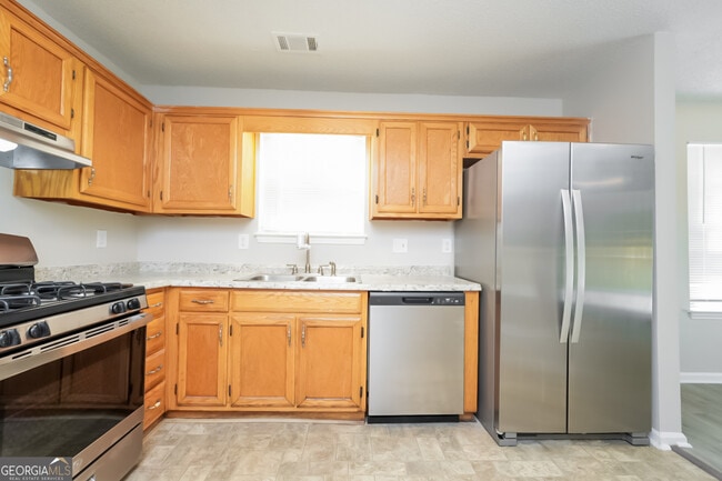 Building Photo - 7127 Hazelwood Dr