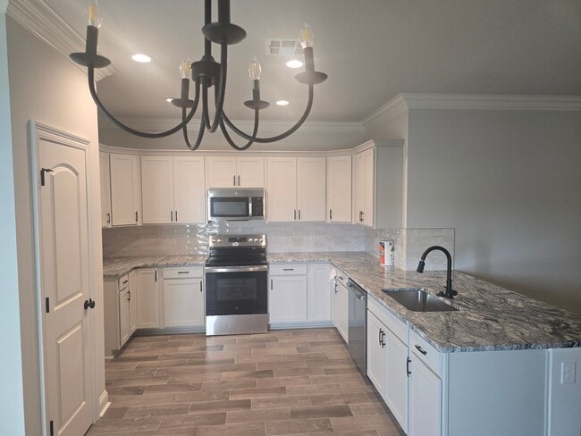 Building Photo - WENDELL IV G in The Cove at Villaggio community offers a 3 bedroom, 2 full bathroom