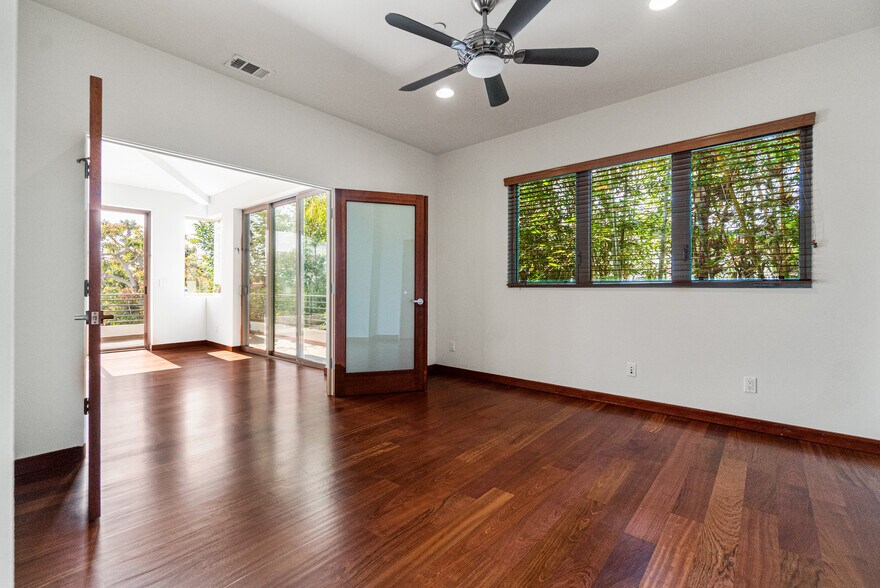Upstairs bedroom with lush bamboo and tree views - 1542 Manhattan Beach Blvd