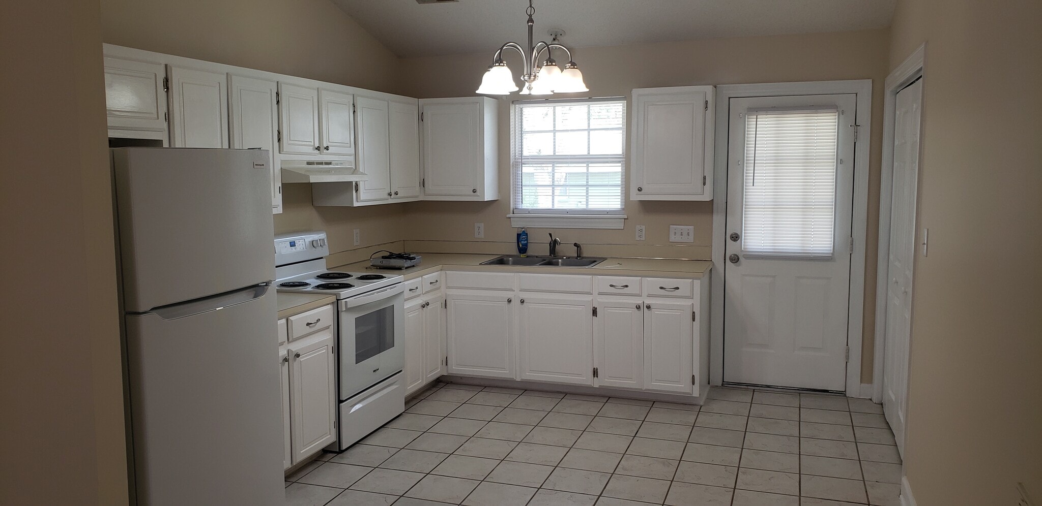 Kitchen- new stove & fridge - 560 Snow Hill St