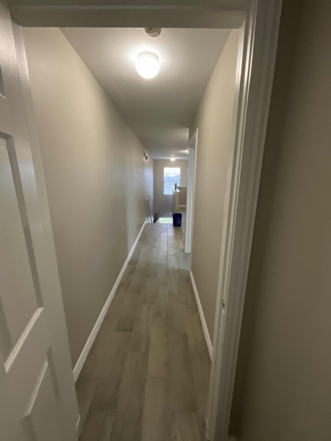 Hallway upstairs leading to the bedroom - 45673 Chapman Ln