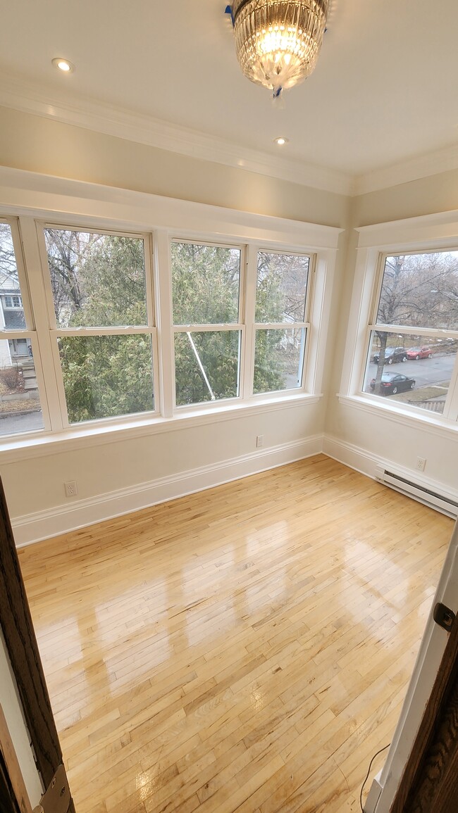 1 of 3 Main level sun rooms (or extra BR, den, office, media room, storage) - 1402 N Girard Ave N