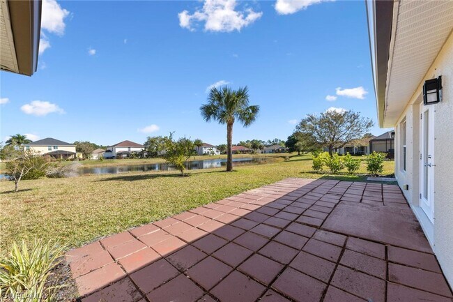 Building Photo - 4BR Home in Gated Town Lakes Community with Lake View