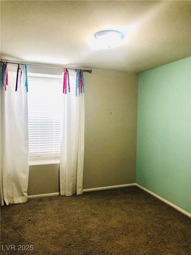 Building Photo - 7108 Adrian Peak St